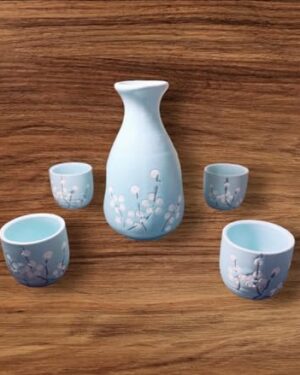 LS LUXURIOUS Blue floral Japanese Porcelain Sake Set with 4 Cups 1 Decanter / Bottle / Carafe Material: Porcelain Colour: Black & Grey Size: Cup is 2"x 1 3/4" , Bottle is 5"x2" Packing of: "5Pcs