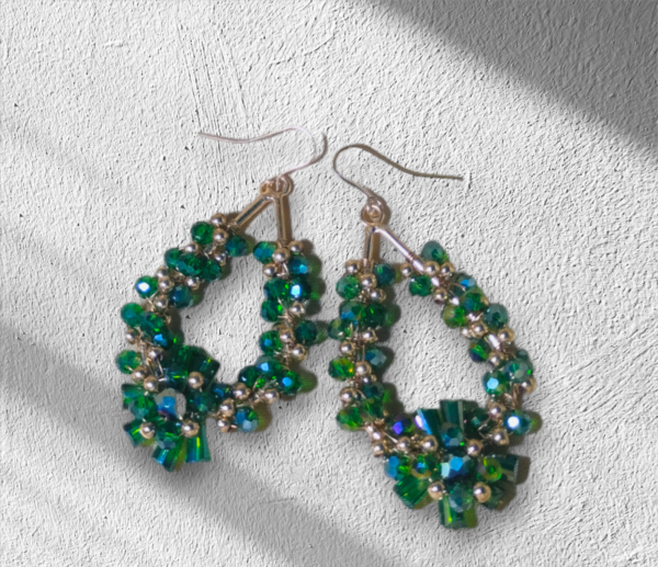 Green gold-plated contemporary drop earrings, has artificial stones and Beads Secured with a fish hook earwire Material & Care Material: Gold-plated brass Stone Type: Artificial StonesWipe with a clean cotton swab when needed